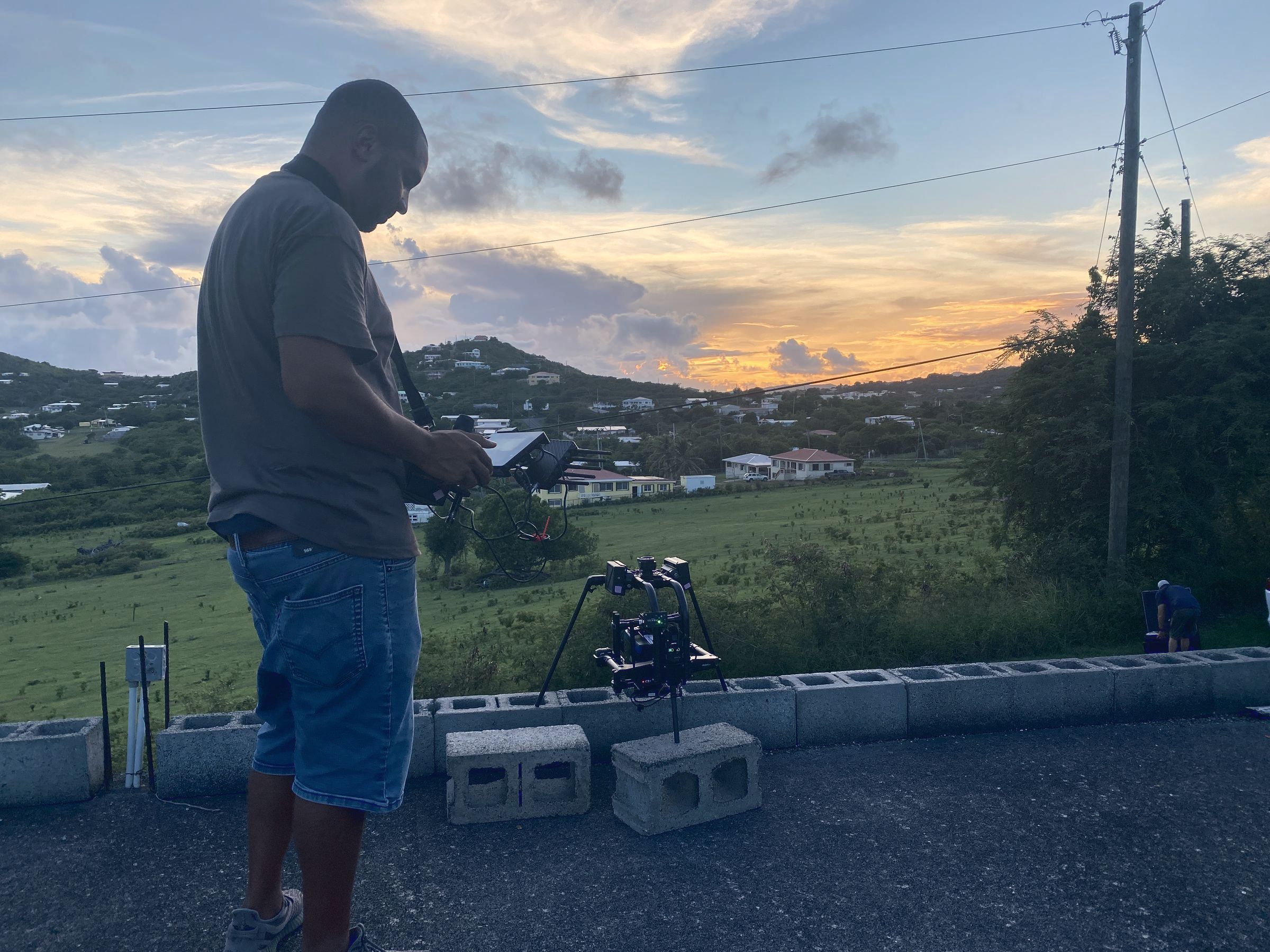 Production crew setting up a commercial shoot at dusk in the U.S. Virgin Islands